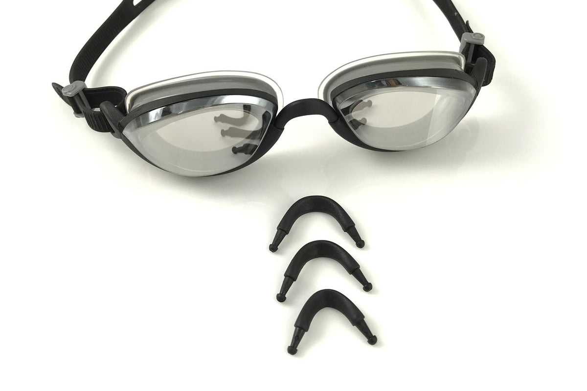 Black clear metallized goggles from S&P shown with the three different sizes of nose pieces that they come with